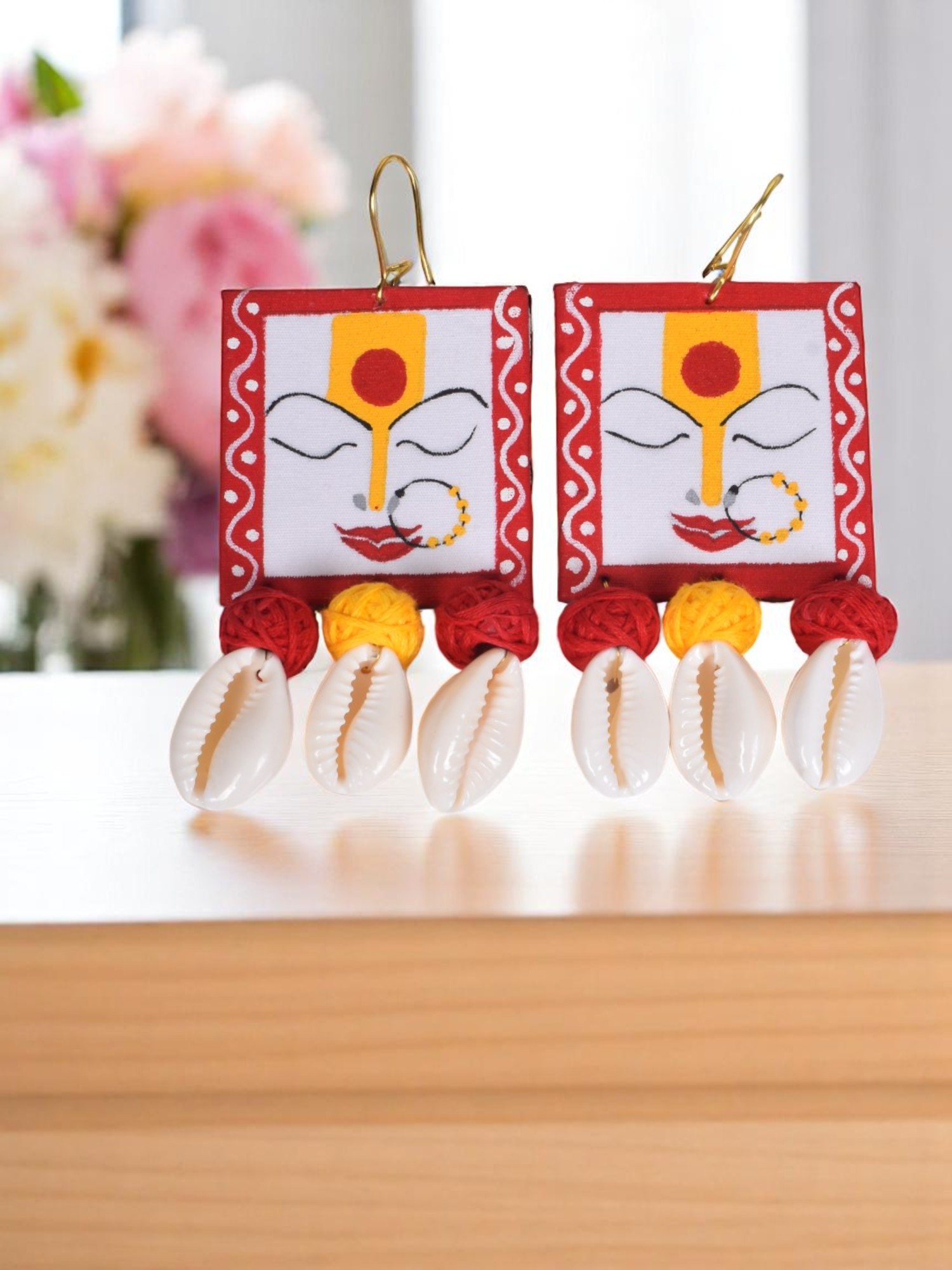 Divine Goddess Motif Earrings with Cowrie Accents