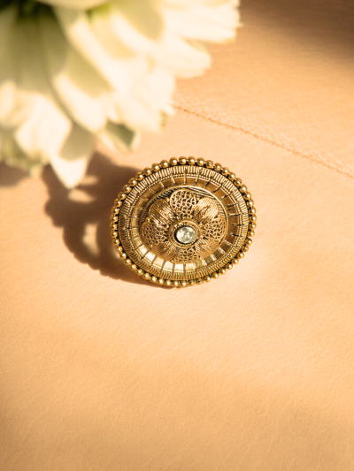 Golden Floral Filigree Ring with Radiant Center Gemstone