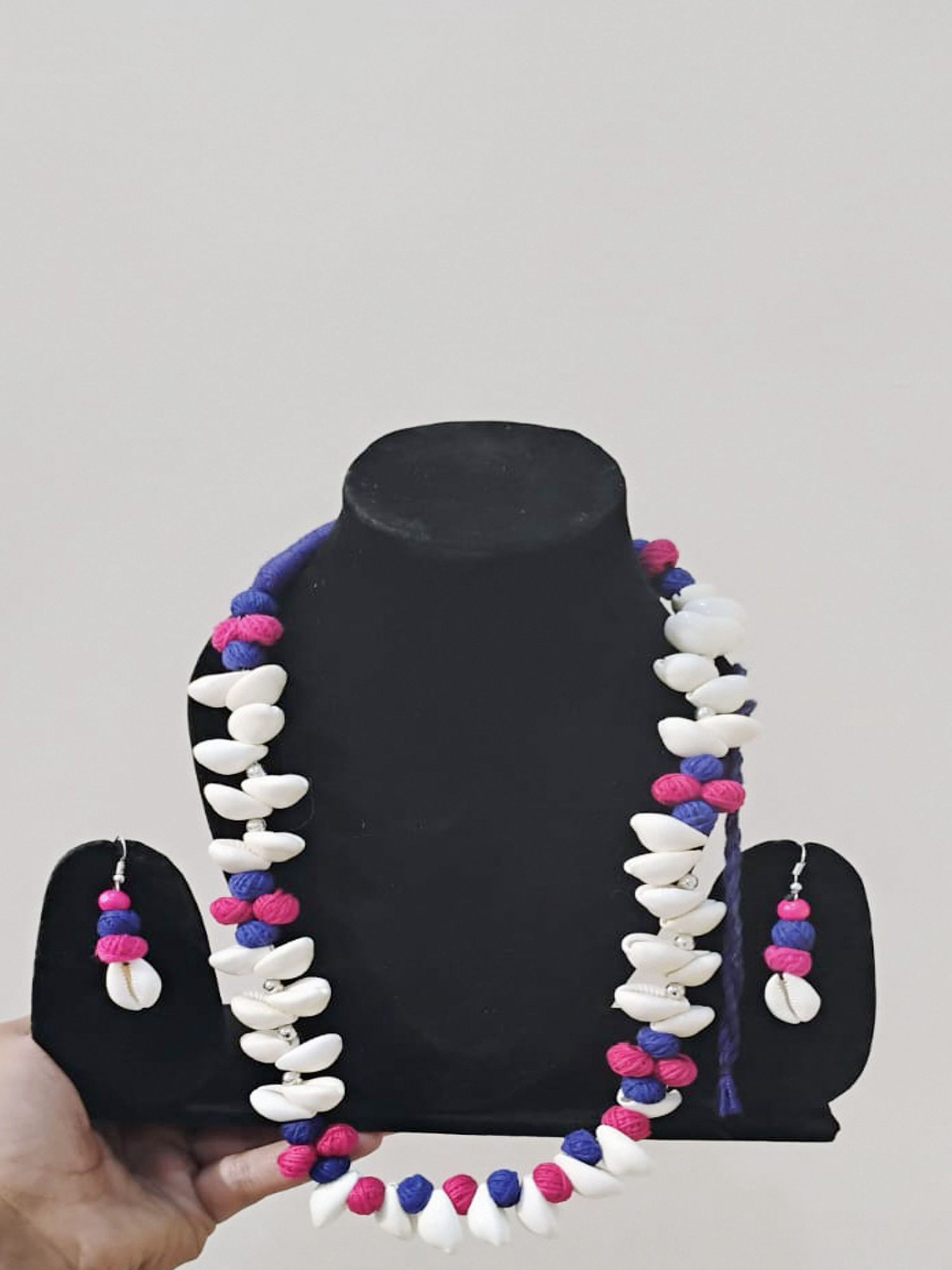 Tribal-Inspired Cowrie Shell Neckpiece with Vibrant Beads