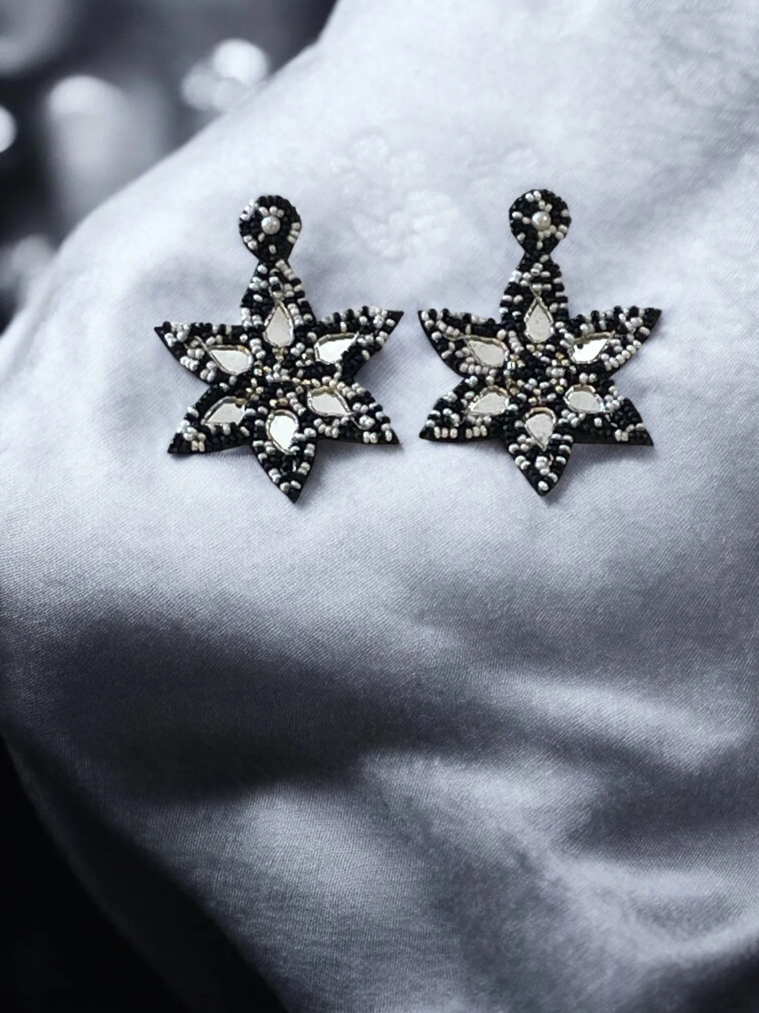Brilliance in Black and white Handmade Star Piercing Earrings