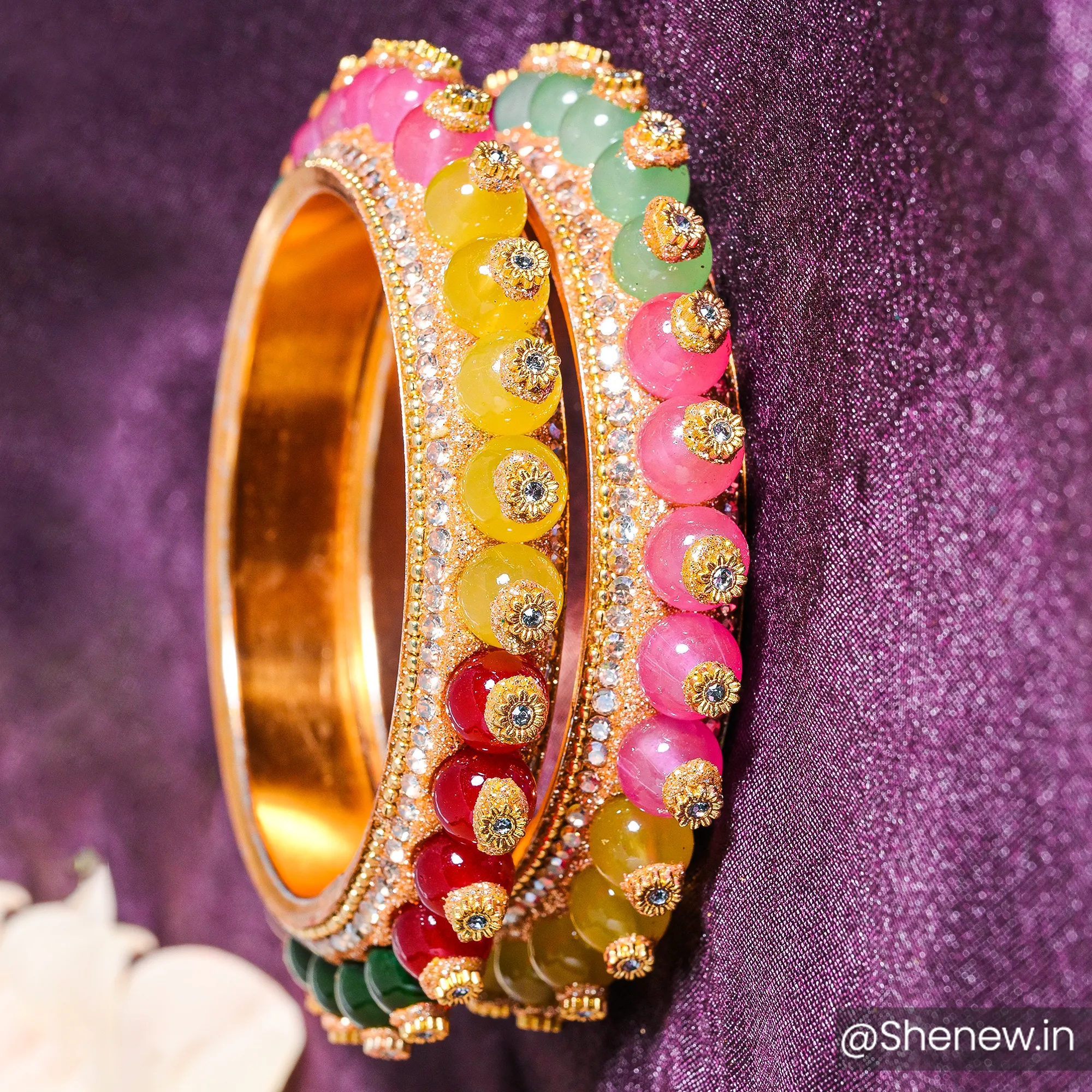 Colorful Stone Studded Bangles with Golden Base – Set of 2