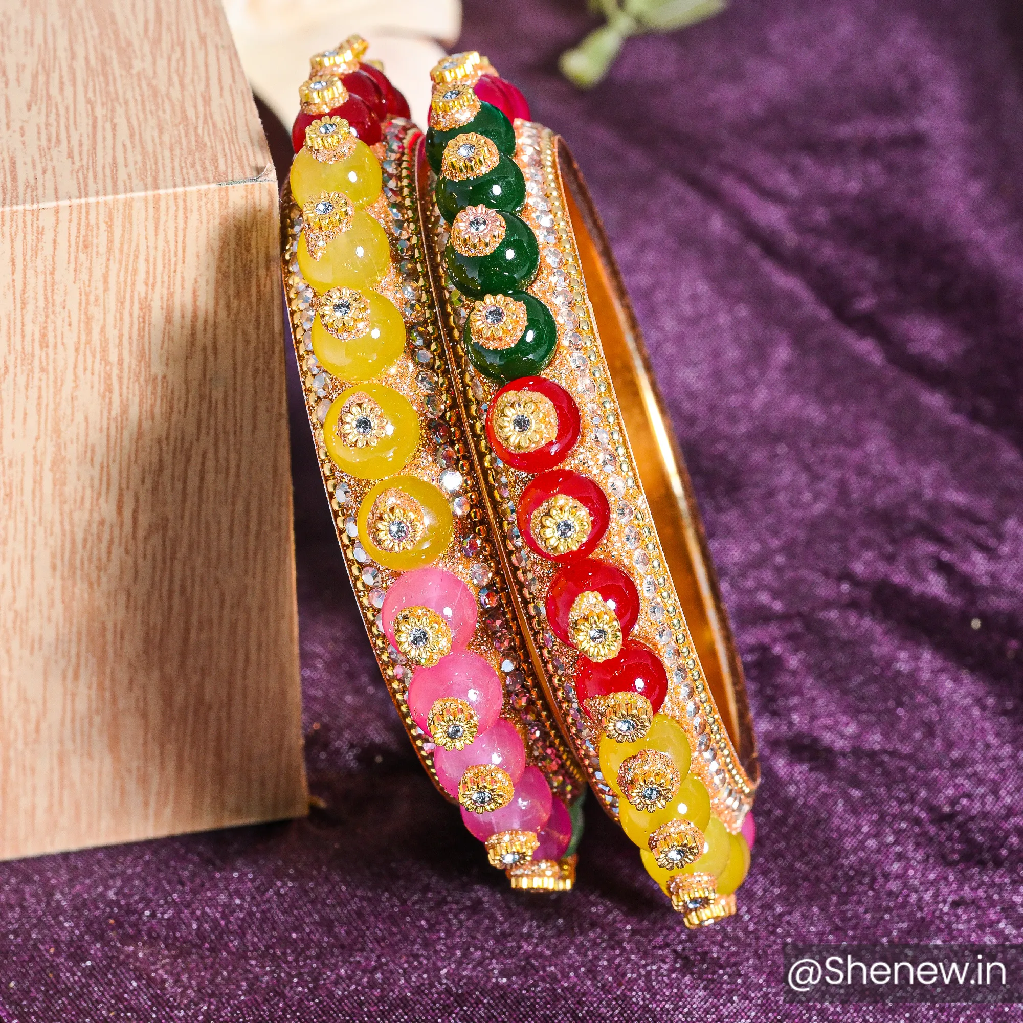 Colorful Stone Studded Bangles with Golden Base – Set of 2